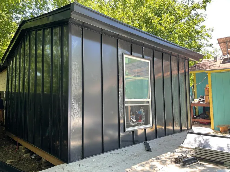 Black standing seam metal wall panels for Roof Inspection in Sikeston