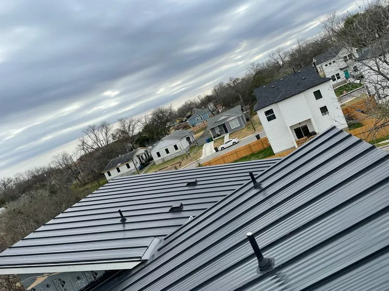 Standing seam metal roof panels with vents for Skylight Repair in Sikeston